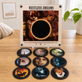 Silent Hill NFC vinyl player and all nine collectible discs on a walnut desk