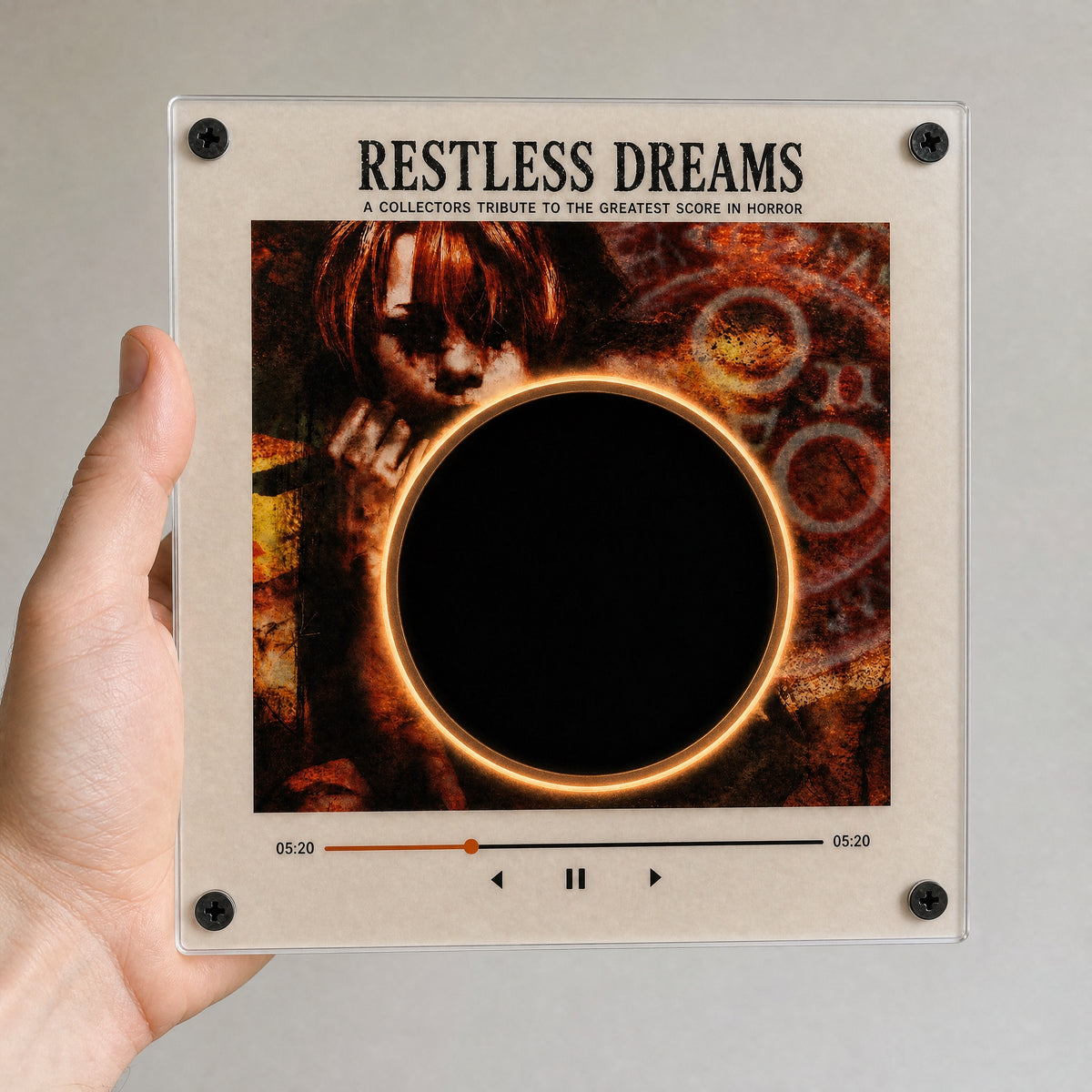 Silent Hill vinyl player held in one hand, showing its 6-inch size